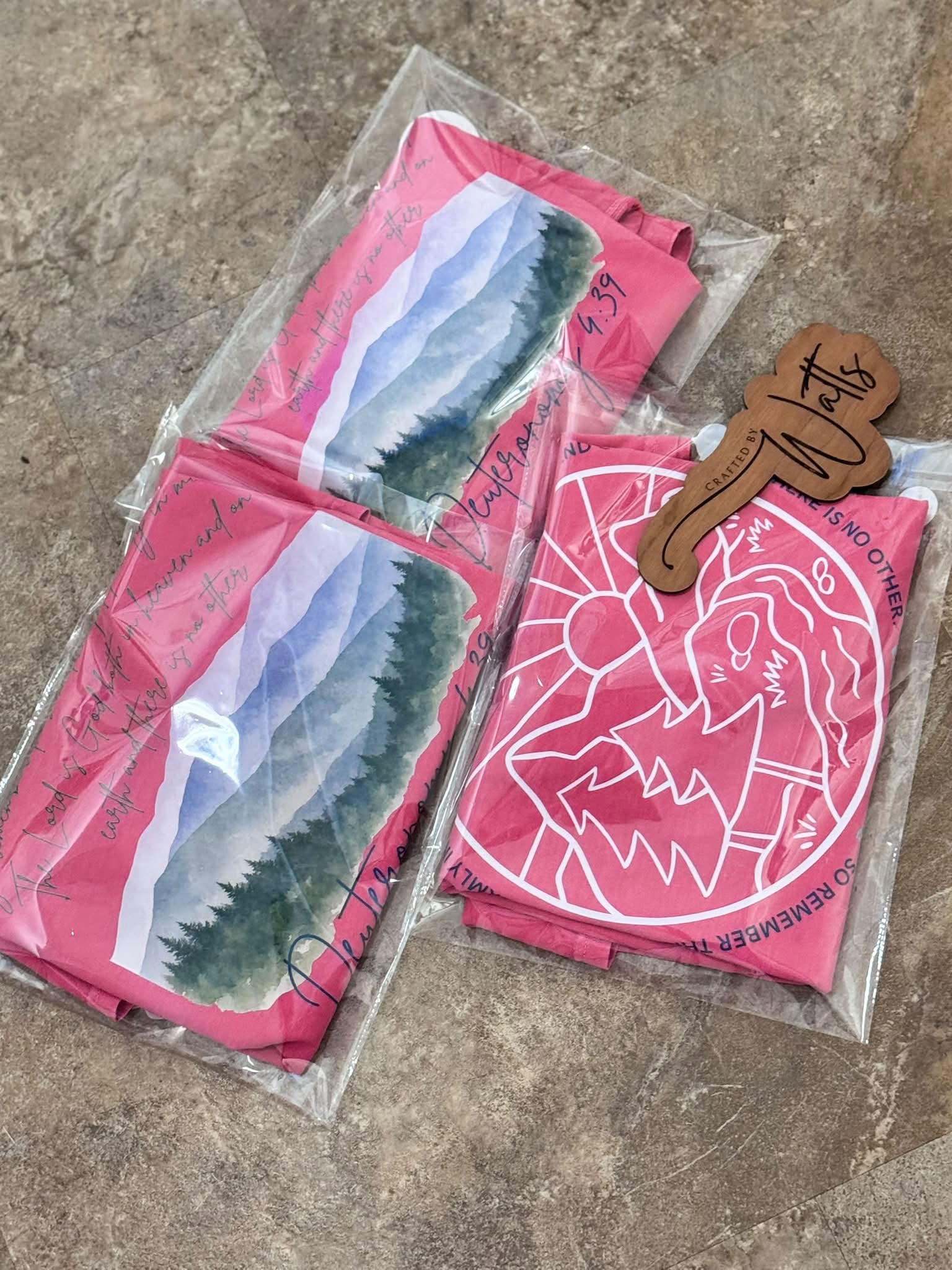 Packaged pink CORE finished shirts